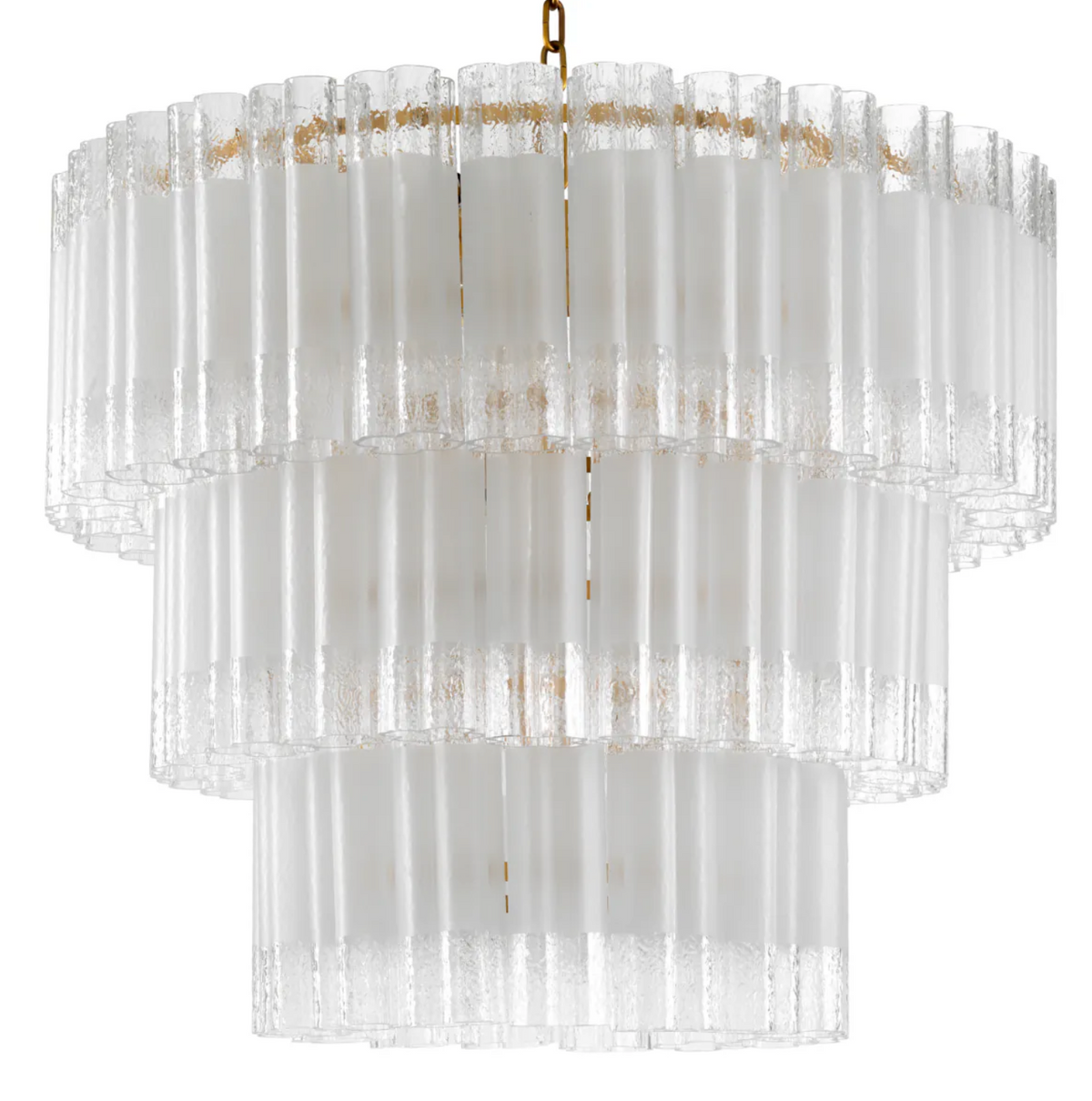 A luxurious Eichholtz Denton L Chandelier featuring large-scale cascading tiers of frosted and clear recycled glass set within an antique brass frame, showcased in a sophisticated grand interior setting by Eichholtz Los Angeles.