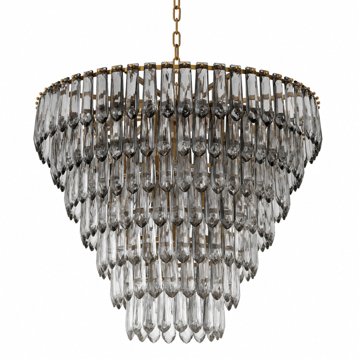 A luxurious Eichholtz Gwendolyn Chandelier featuring cascading tiers of smoke and clear glass set in an antique brass frame, showcased in a sophisticated dining room setting by Eichholtz Los Angeles